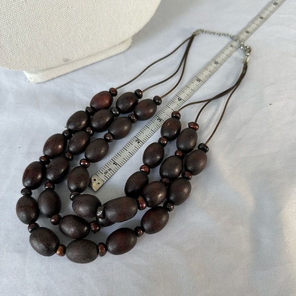 Triple strand dark brown wood bead necklace - Picture 3 of 4